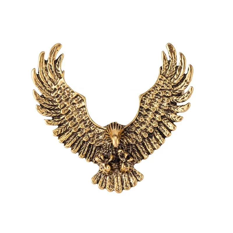 Vintage gold eagle lapel pin on white background