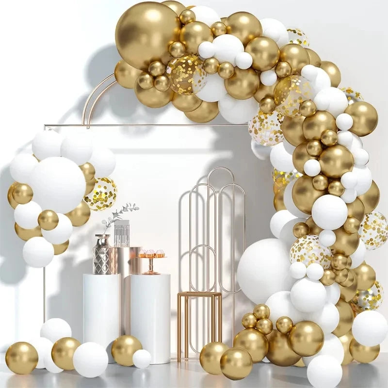 Balloon arch with gold and white balloons on a white background