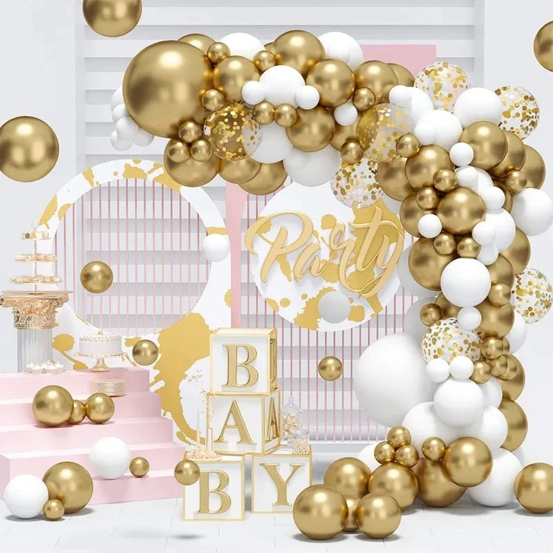 Decorative arch made of gold and white balloons with 'Baby' and 'Party' text in the center.